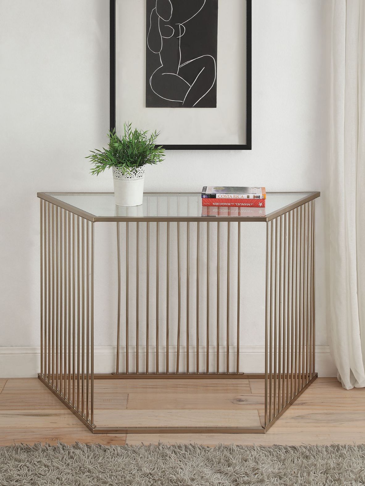Mesa auxiliar Oaklie de cristal transparente y color champán