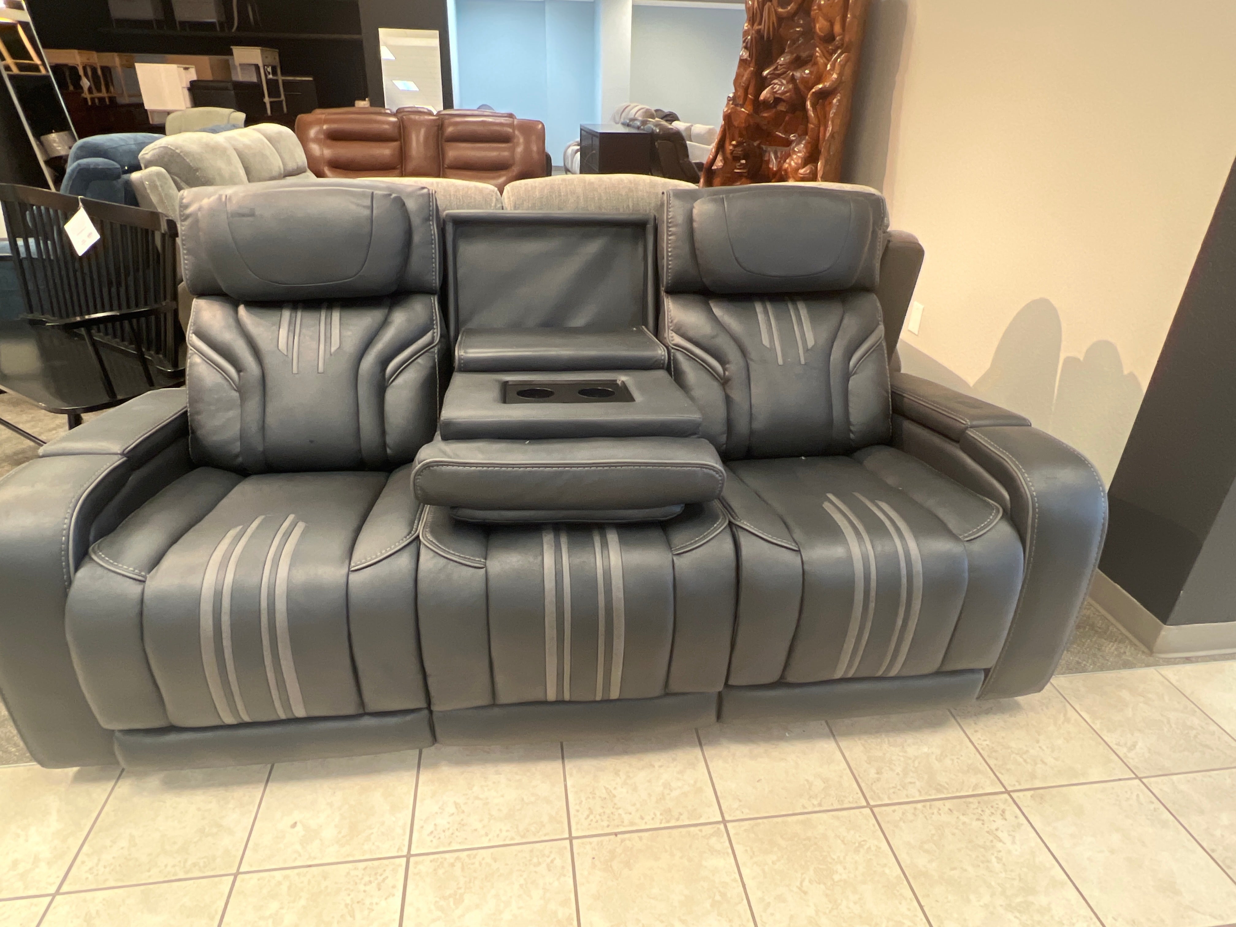 Motorized dark grey reclining sofa
