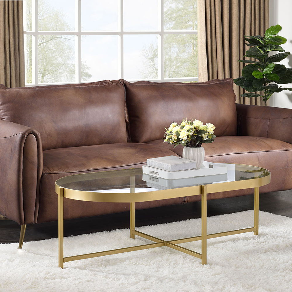 Charrot - Mesa de centro - Vidrio transparente y acabado dorado